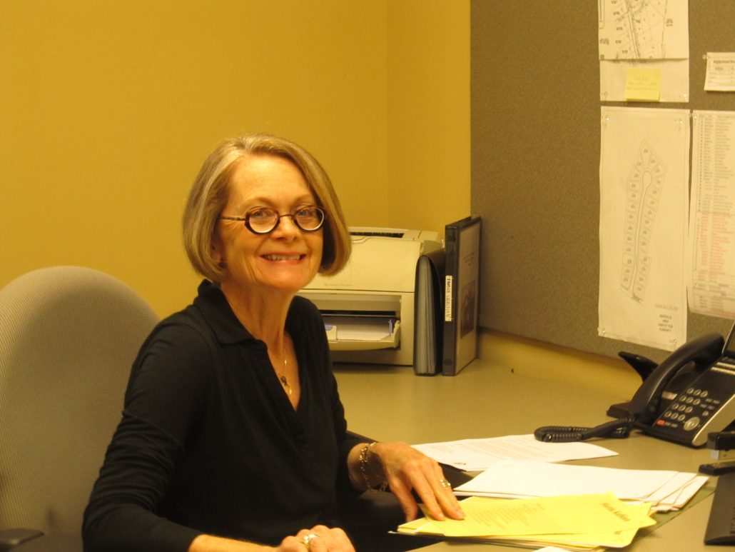 Rhoda volunteering in the admin office in 2014.